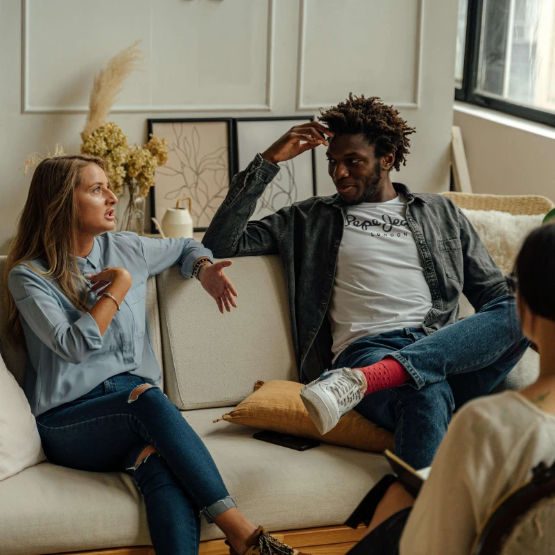 a mixed race couple in a therapy session